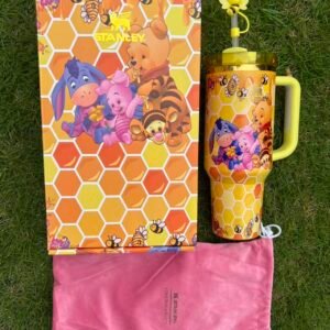 Custom honeycomb Winnie the Pooh and friends Stanley Cup 40 oz with 3D bee straw topper, matching gift box, and pink dust bag