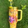 Custom honeycomb Winnie the Pooh and friends Stanley Cup 40 oz with 3D bee straw topper, matching gift box, and pink dust bag Honeycomb character tumbler with handle and bee topper