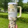 Vintage classic Winnie the Pooh Happy Birthday Stanley Cup 40 oz with 3D bee straw topper and matching gift box Pooh-inspired 40oz birthday tumbler with bee topper
