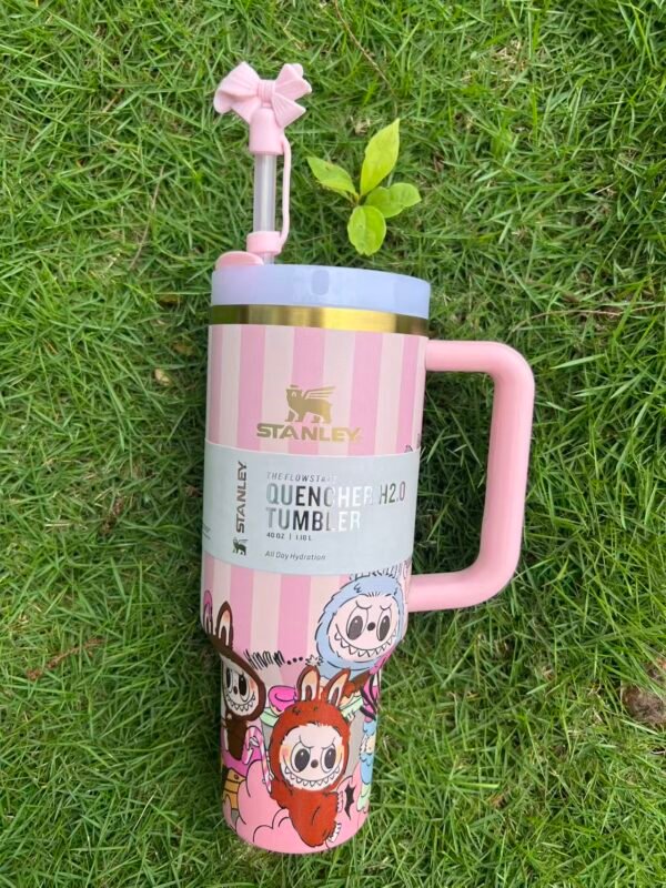 Pink striped character-style tumbler with handle and reusable straw