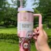 Pink bow straw topper and 40oz tumbler details