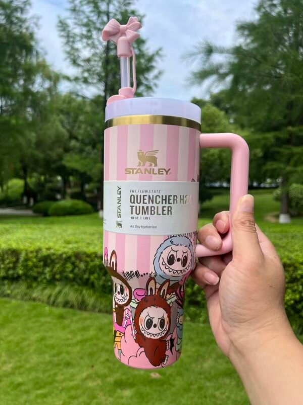 Pink bow straw topper and 40oz tumbler details