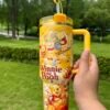 Disney Winnie the Pooh Stanley Cup 40 oz Quencher Tumbler with Handle & Bee Straw Topper Gift Set Honey-yellow character tumbler with handle and reusable straw